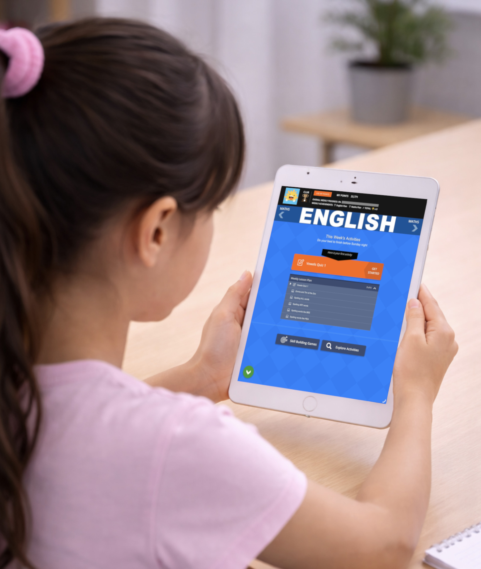Child completing a Kinetic Education learning plan on a tablet