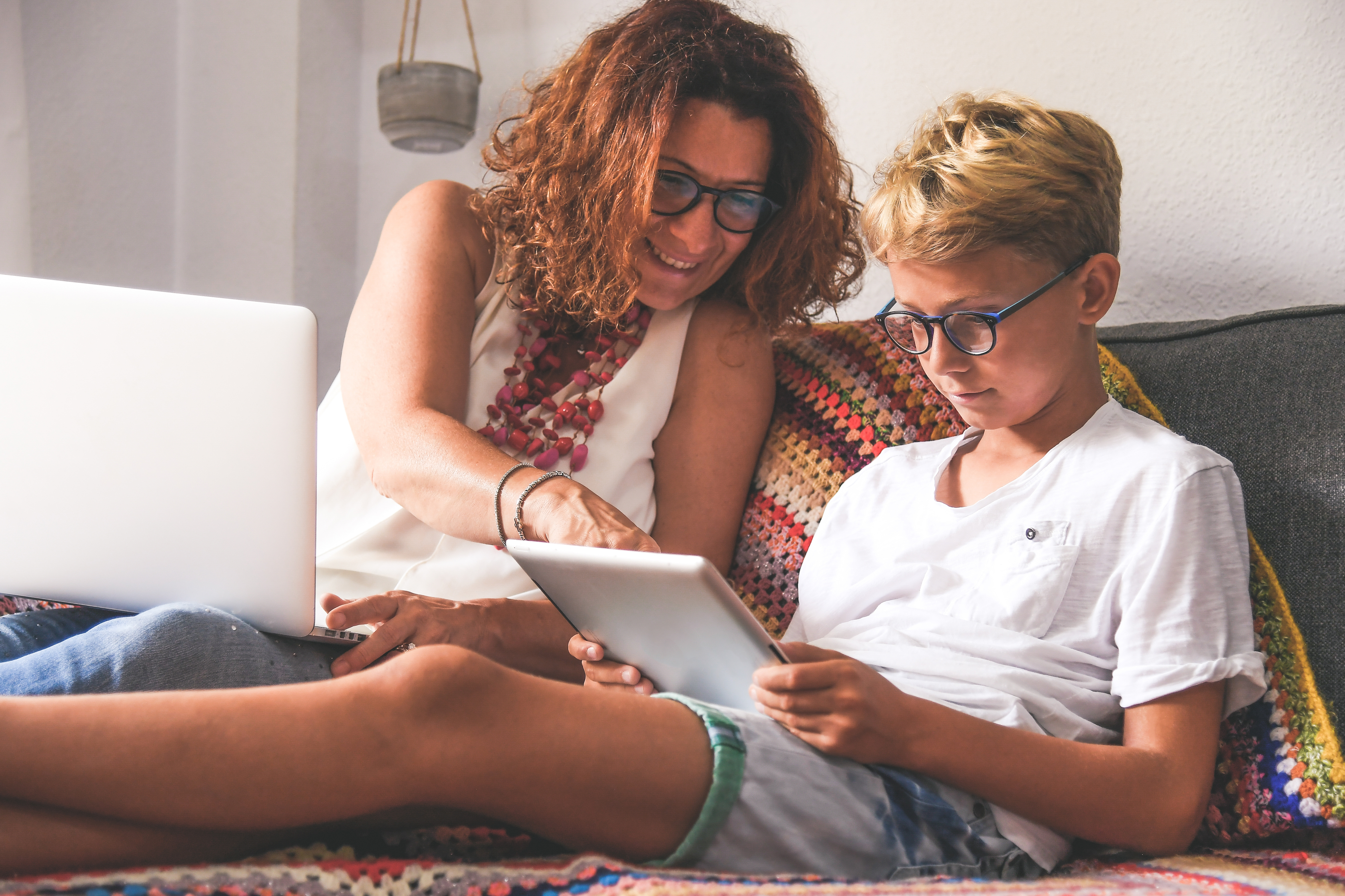 Parent supporting a child with learning at home