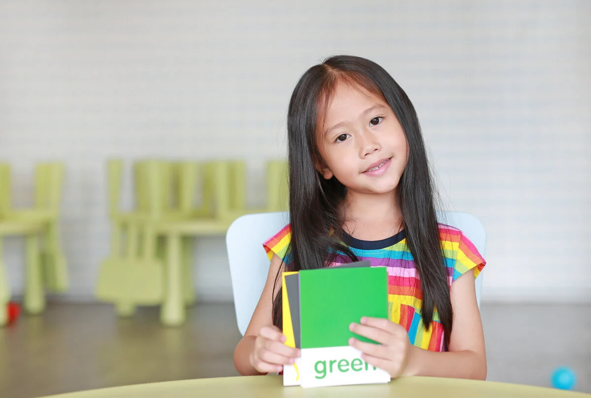 Child learning to read sight words